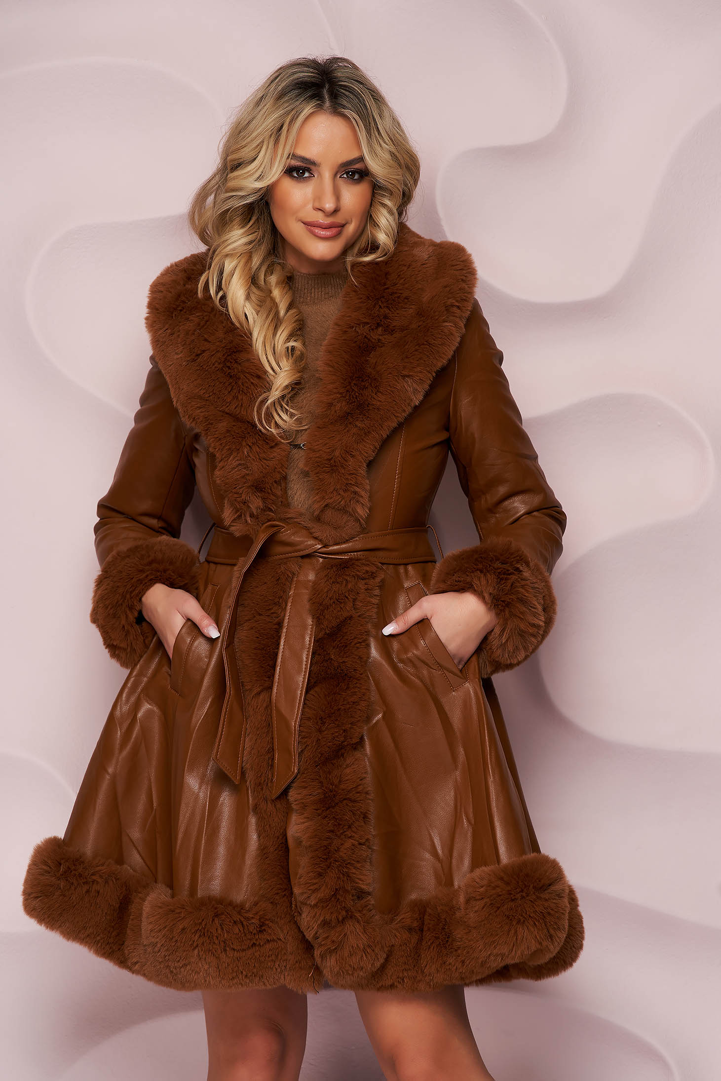 Brown jacket from ecological leather tented with faux fur details