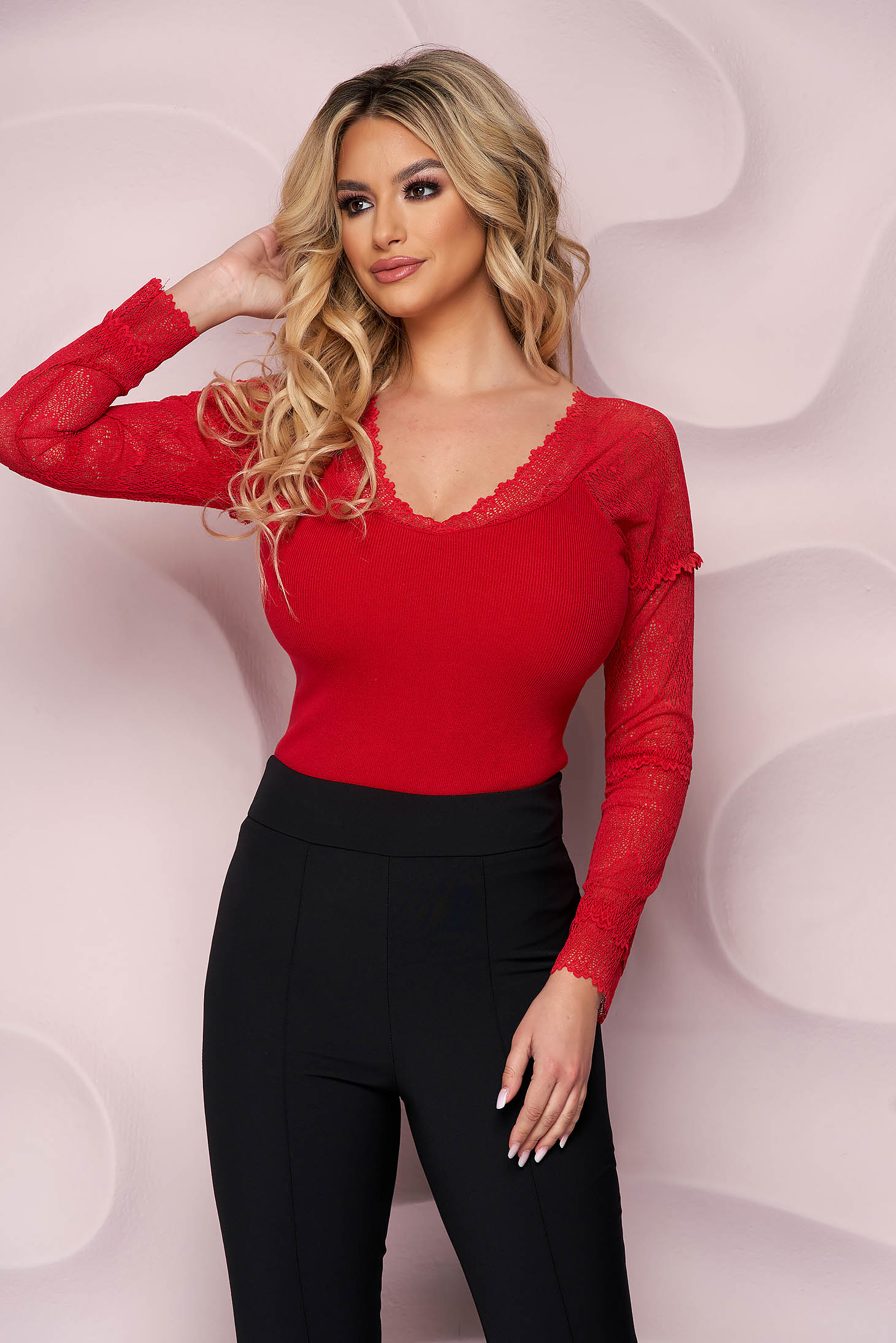 Red women`s blouse knitted with laced sleeves elegant